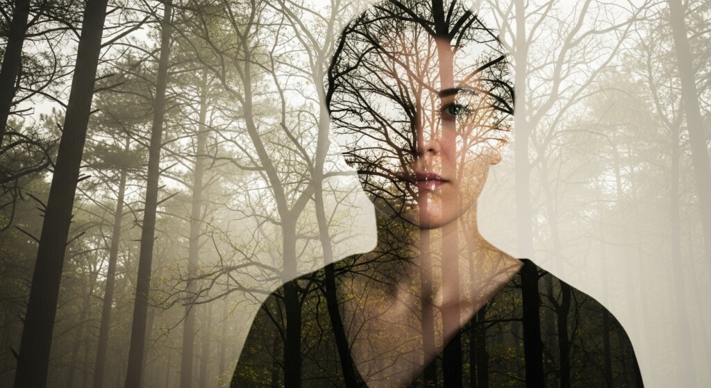 portrait blended with forest trees through double exposure effect